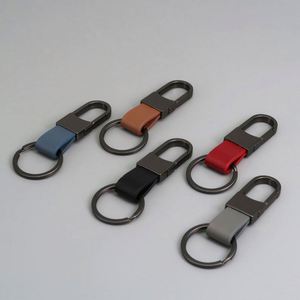 Factory Direct Sale of PU Car Keychains with Gravure Printing <b>Custom</b> Logo High Quality Soft Durable Modern Art Design <b>Key</b> <b>Rings</b> - Product Image 2