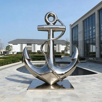 Statue d'ancrage moderne en acier inoxydable de grande taille avec détails de corde, sculpture métallique d'extérieur sur le thème maritime pour aménagement paysager