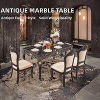 Ensemble de salle à manger néoclassique européen en gros, table rectangulaire en bois d'acajou noir avec plateau en marbre et accents dorés rotatifs