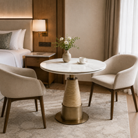 Japandi Weißer Marmor Runder Tisch Designer Bistrotisch mit Goldener Konischer Säule für Luxus-Apartment Essbereich