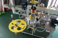 Applicateur d'étiquettes automatique SKILT pour l'étiquetage d'un coin ou de deux coins des petites boîtes, des cartons, des boîtes cadeaux |   Machine d'étiquetage adhésif
