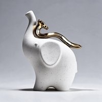 Figurine d'éléphant en céramique moderne avec accent serpent doré, sculpture animale mouchetée, décoration d'intérieur, cadeau du Nouvel An