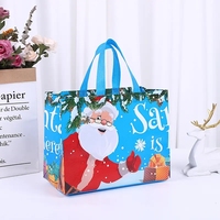 Fabricants de sacs cadeaux de Noël en gros sac laminé à main non tissé impression de sac non tissé logo de marchandises de pressage à chaud