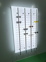 Présentoir mural personnalisé pour lunettes de soleil, présentoir optique, présentoir à lunettes verrouillable avec barres de présentation et éclairage LED