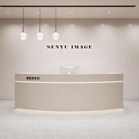 Comptoir laqué moderne semi-circulaire personnalisé de luxe de lumière de bureau de réception pour le magasin d'habillement de salon de beauté caissier incurvé