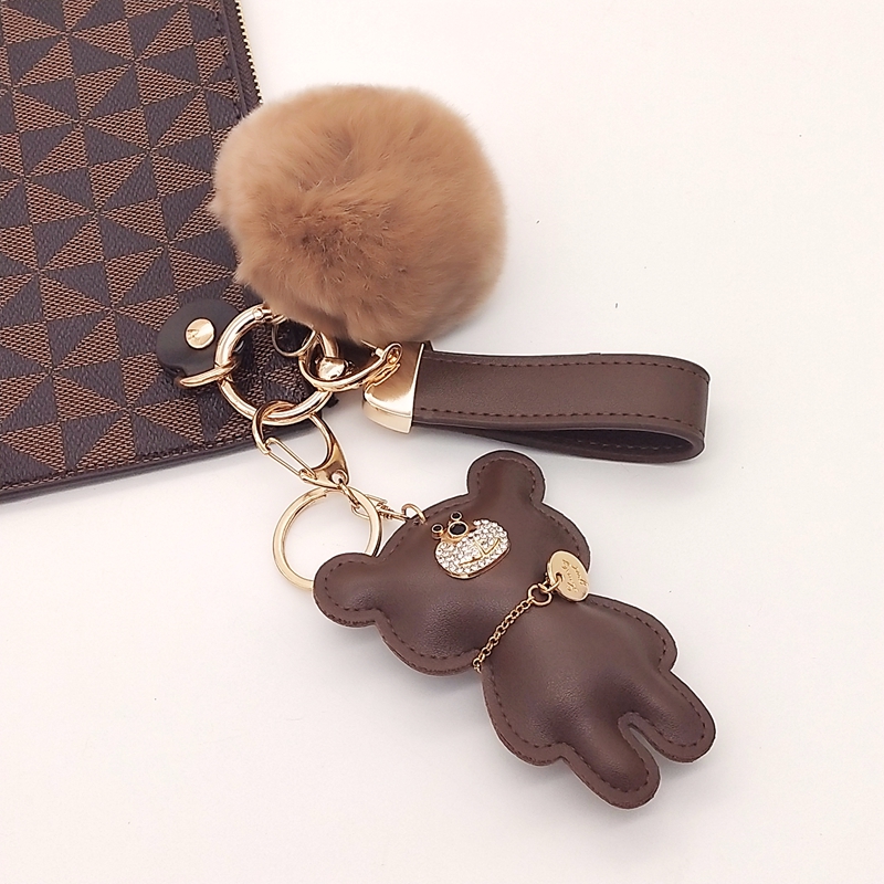 Dark brown with pompom