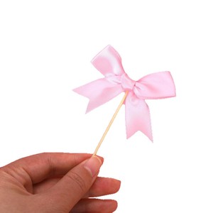 ท็อปเปอร์คัพเค้กรูปโบว์สีชมพูหวานๆ ลายฮันนี่แอนด์สวีทเนส 12 ชิ้น ของตกแต่งเค้กอะคริลิค สำหรับวันเกิด วันวาเลนไทน์ วันแม่ - Product Image 5