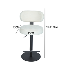 Tabouret de bar pivotant blanc moderne avec dossier souple, coussin épais et repose-pieds en T pour coin café, librairie ou bar
