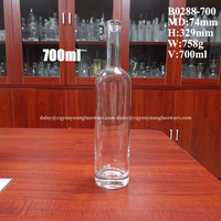 Bouteilles en verre transparentes cylindriques de 70 cl pour whisky, vodka et spiritueux à vendre