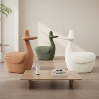 Fauteuil de salon en tissu en forme de canard créatif avec roulettes, design moderne pour salon et hôtel