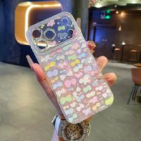 Nouvelle coque de téléphone anti-traces de doigts PC+TPU avec grande fenêtre, cadre d'objectif floral, coque latérale en coquille colorée diamantée et nœud macaron pour 17 Pro Max 16