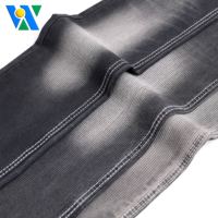 Tela vaquera a rayas de mecha de 9,8 oz para tela vaquera negra 12S Fabricantes de tela vaquera tejida de sarga de elasticidad media