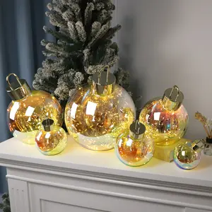 Vente en gros d'ornements de table décoratifs personnalisés de 10/13/15/20/25/30cm boules de verre de Noël de luxe dorées claires