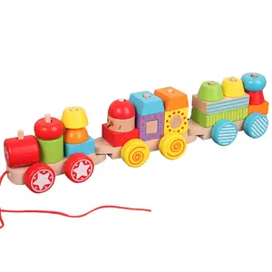 Ahşap yapı taşı tren oyuncak şekil sıralayıcısı ve istifleme oyunu yürümeye başlayan Montessori entelektüel okul öncesi eğitim çekme oyuncak