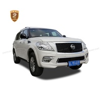Mise à niveau vers le kit de carrosserie en matériau Infini-ti Qx80 PP comprenant une grille centrale de pare-chocs avant pour Nissan Tourle
