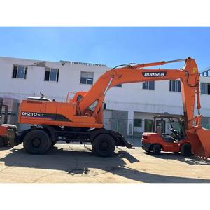Excavatrice sur pneus d'occasion DOOSAN DH210W de 21 tonnes, à réponse rapide, conception économe en énergie, pour travaux de réparation routière urbaine et excavations - Product Image 1