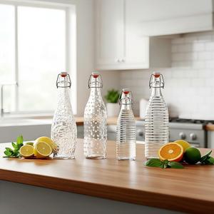 Bouteilles <span class=keywords><strong>en</strong></span> <span class=keywords><strong>verre</strong></span> rondes à bouchon basculant de 250 ml, 500 ml, 750 ml, 1000 ml pour <span class=keywords><strong>eau</strong></span> minérale et <span class=keywords><strong>eau</strong></span> gazeuse, traitement de <span class=keywords><strong>surface</strong></span> par estampage à chaud, vente <span class=keywords><strong>en</strong></span> gros - Product Image 5