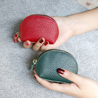 Nouveau simple rétro mini porte-monnaie en peau de vache petit portefeuille femmes en cuir véritable boulette fermeture éclair sac à monnaie