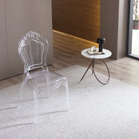 Chaise de salle à manger moderne en polycarbonate transparent, légère, robuste et écologique pour une utilisation intérieure et extérieure