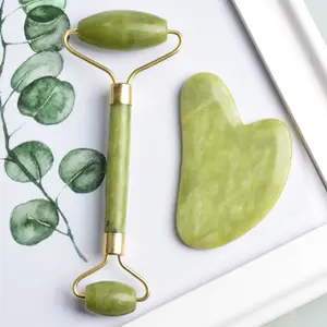 Cheap new arrival 100% Natural Green jade roller with iron framing facial face roller gua sha stone For Women