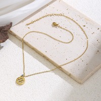 Collier Cœur Creux Simple avec Breloque Ronde et Petite Perle Bleue – Accessoire de Mode Chic et Tendance pour Femme – Vente en Gros TGXL14709