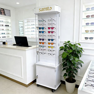 Acrylique 360 °   Présentoir rotatif à roulettes et verrouillable pour lunettes LED – Support de sol pour montures de lunettes et de soleil pour magasins de détail et boutiques de marques - Product Image 1