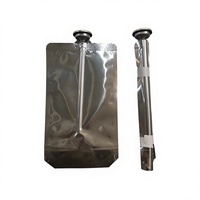 Machine d'emballage pneumatique automatique haute efficacité pour sachets aérosols et sacs BOV, avec application de ruban adhésif précise et enroulement