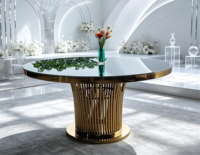 Table de banquet de luxe en verre rond avec base verticale en acier inoxydable doré pour location événementielle