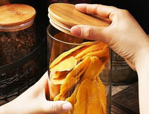Eco-Friendly Leak-Proof Kitchen <b>Storage</b> Candy Tea Coffee Cylinder High Borosilicate Round Airtight Glass Jar With Bamboo Top Lid - Product Image 2