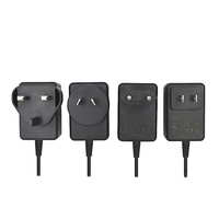 Adaptateur secteur 12W avec prise UK, affichage numérique LED, entreprise certifiée ISO 14001, robot intelligent du sud de la Chine, Happy Valley, 12V AC/DC 24W