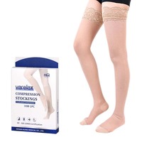 Bas de contention pour femmes, opaques, mi-cuisses, sexy, respirants, en nylon et élasthanne, tricotés, unis, avec bordure en dentelle