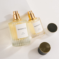 Flacon de parfum cylindrique de luxe personnalisé 30ml 50ml avec étiquette, logo personnalisé, pompe pulvérisatrice à vis, bouteille en verre vide avec bouchon