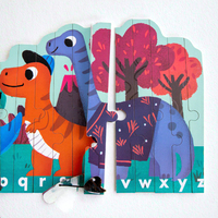 Puzzle en bois alphabet dinosaures pour enfants, apprentissage des lettres, scène volcanique, découpe laser, non toxique, finition mate, boîte cadeau, usine OEM