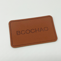Écussons en cuir personnalisés du fabricant à bon prix Écussons en cuir gaufré avec logo pour sac à main Étiquettes en cuir pour chapeau/vêtement