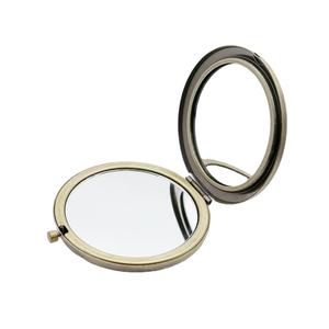 กระจกแต่งหน้าพกพาแบบโลหะและกระจก ขนาดเล็ก 70 มม. สองด้าน สกรีนโลโก้ได้ 3 สี สำหรับใช้ในบ้านอัจฉริยะ ปี 2024 - Product Image 2