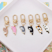 Porte-clés en métal mignon en forme de chat, pendentif léger et décoratif pour sac et étui d'écouteurs