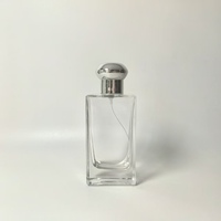 Vente en gros de flacons de parfum carrés en verre de luxe personnalisés de 50 ml avec pulvérisateur à pompe, impression sérigraphique, diffuseur de parfum en boîte