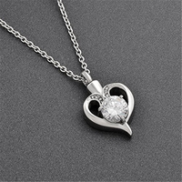 Urna Funeraria de Lujo de Acero Inoxidable Plateada con Colgante de Corazón de Cristal Ecológica