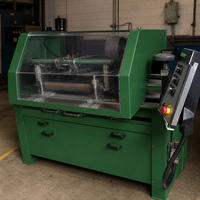 Broyeur à bobines Express Dual 3000MC avec système de serrage électrique et traversée automatique pour l'entretien des tondeuses à bobines. Prix de dépôt est de