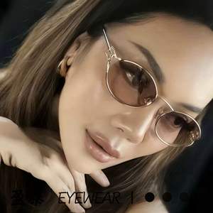 2025ファッションUV400プロテクションインサングラス多用途ストリートスタイル中空オーバルキャットアイデザイン - Product Image 1