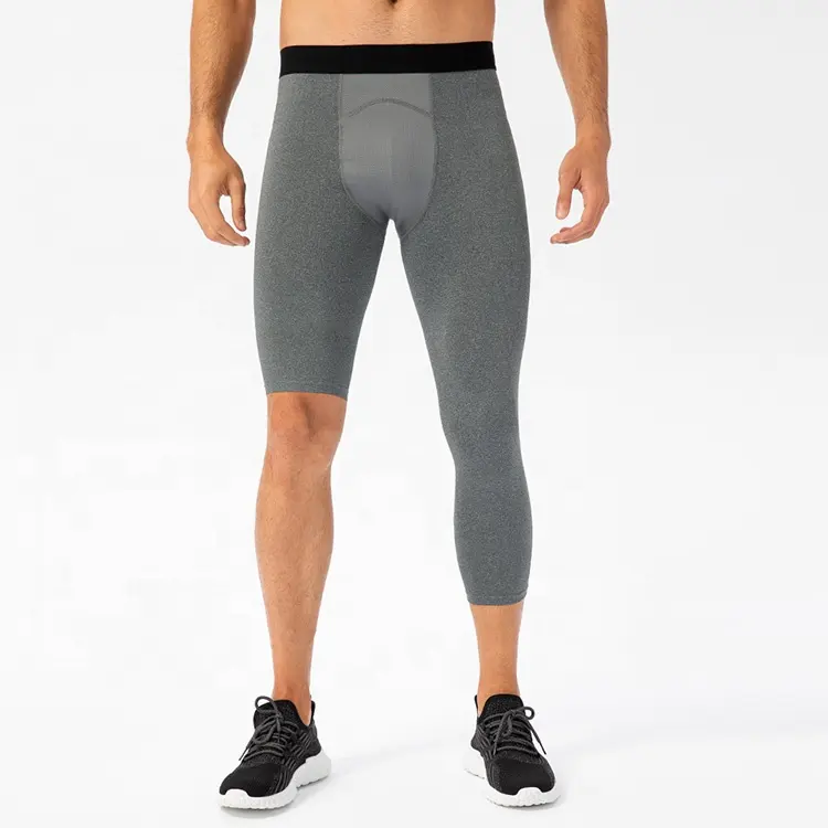 Pakaian gym kustom celana kompresi pria legging ketat capri satu kaki 3/4 celana ketat untuk basket