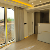 Conteneur préfabriqué en acier Hôtel Péniche Capsule Maison sur l'eau Maison modulaire flottante Petite Maison Logement mobile