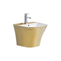 Ensemble de toilettes monobloc en céramique à poser au sol, design moderne et luxueux, couleur or, lavabo mural