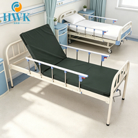 Lit médicalisé manuel à manivelle unique, structure en acier, dossier réglable avec support de perfusion et table de lit pour hôpital et clinique