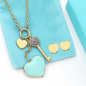 Set di Gioielli con Collana a Catena <span class=keywords><strong>in</strong></span> <span class=keywords><strong>Acciaio</strong></span> Inossidabile e Orecchini con Pendente a Forma di Cuore <span class=keywords><strong>in</strong></span> Due Pezzi - Product Image 1