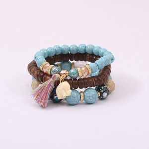 Trendz Simple y seguro bebé elefante con flecos de madera del grano elástico pulsera de niños - Product Image 3
