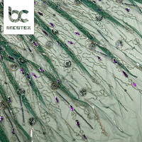 Tissu de mariage en dentelle brodée perlée perles et paillettes de luxe tissu en dentelle pour robe de soirée
