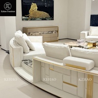 Solution de mobilier pour la maison : Canapé incurvé contemporain sur mesure en cuir Nappa pleine fleur avec éclairage LED intégré pour villa de luxe