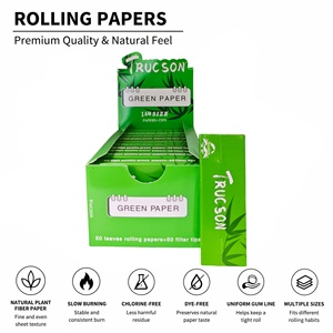 Papiers à rouler TRUCSON verts, format 1 1/4, fibres végétales naturelles, combustion lente, 50 feuilles + 50 filtres par carnet, 24 carnets par boîte - Product Image 1