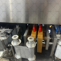 Nouvelle machine d'emballage automatique de sachets liquides de qualité alimentaire, à ouverture facile à une main, avec étiquetage et capsulage, pour sachets à base de cartes.